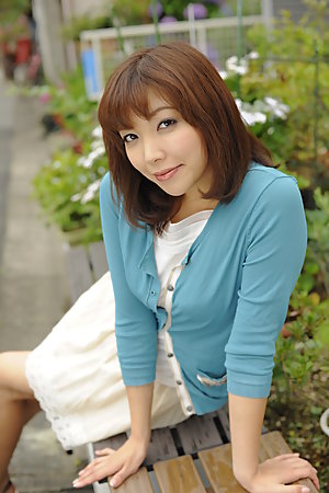 Juri Kitahara in blue sweater and lace skirt