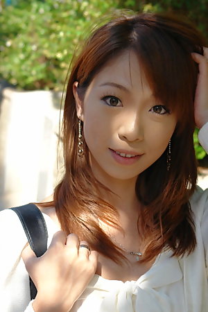Yuri Rie gives blowjob in the car and shows