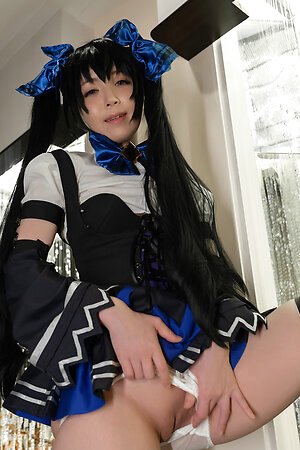?ute Japanese girl Mari Hirose in a schoolgirl costume poses on the street and at home, exposing her shaved pussy and ass