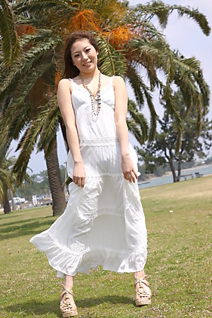 Hot darling Manami Ichikawa posing outdoors